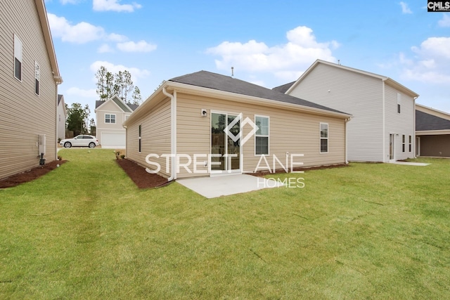rear view of house with a lawn