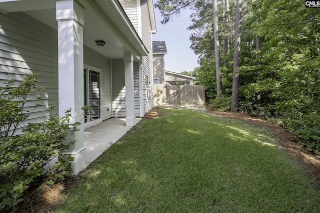 view of yard with fence