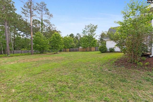 view of yard with fence