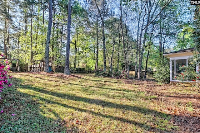 view of yard featuring fence