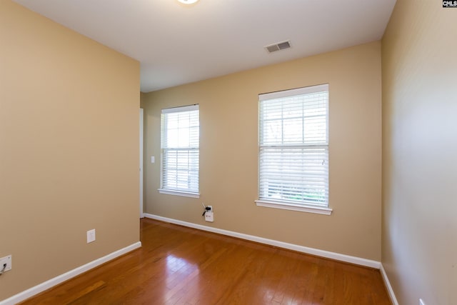 236 Crimson Oak Dr, Lexington, SC 29072 - spare room featuring baseboards, visible vents, and hardwood / wood-style flooring