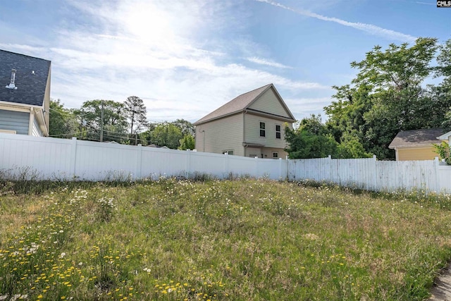 view of yard with fence
