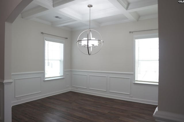 509 Malachite Ln, Chapin, SC 29036 - unfurnished dining area featuring dark wood-type flooring, arched walkways, coffered ceiling, and a notable chandelier