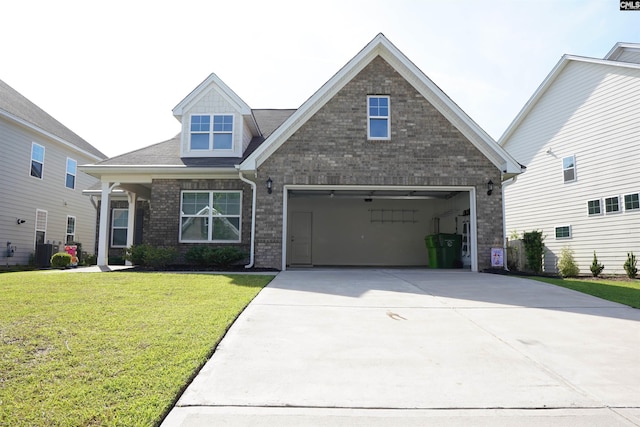 509 Malachite Ln, Chapin, SC 29036 - view of front of home with a garage, a front yard, cooling unit, brick siding, and driveway
