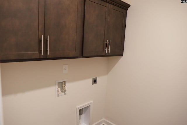 509 Malachite Ln, Chapin, SC 29036 - laundry area with cabinet space, electric dryer hookup, baseboards, and hookup for a washing machine