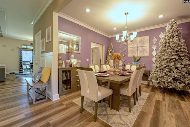 309 Creek Ridge Loop, Blythewood, SC 29016 - dining area with crown molding, wood finished floors, and a notable chandelier