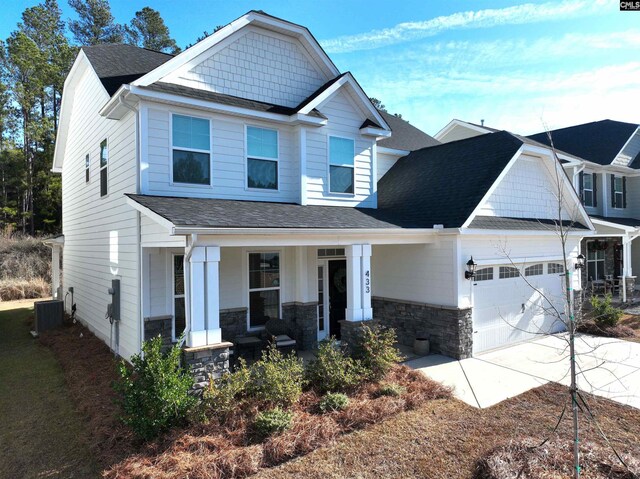 433 Outer Banks Dr, Lexington, SC 29072 - craftsman inspired home featuring covered porch, stone siding, and a shingled roof