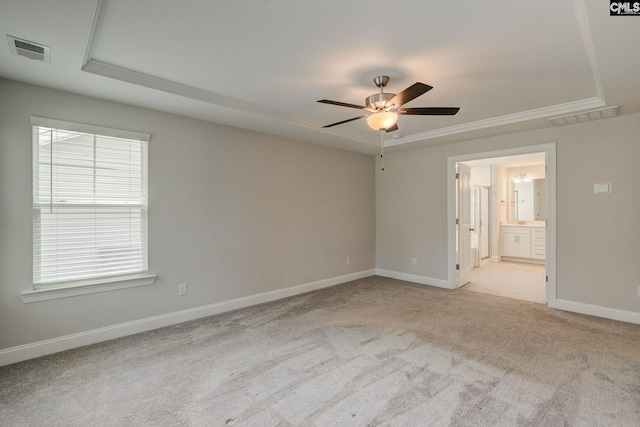 433 Outer Banks Dr, Lexington, SC 29072 - spare room with a raised ceiling, carpet floors, healthy amount of natural light, a ceiling fan, and crown molding