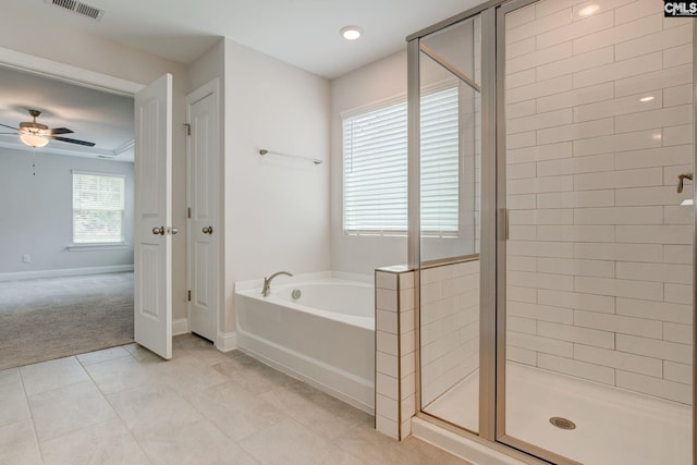 433 Outer Banks Dr, Lexington, SC 29072 - full bath with a garden tub, ceiling fan, a shower stall, and tile patterned flooring