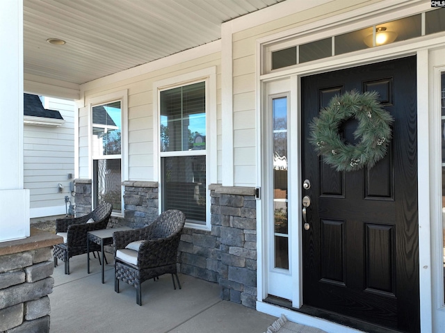 433 Outer Banks Dr, Lexington, SC 29072 - view of exterior entry featuring covered porch and stone siding