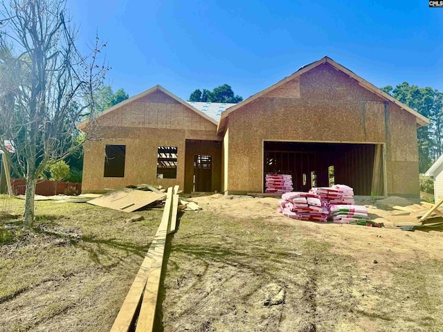 view of front of home with an attached garage and stucco siding