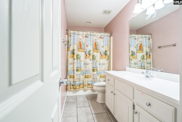 full bath with shower / bath combo, vanity, toilet, tile patterned floors, and visible vents