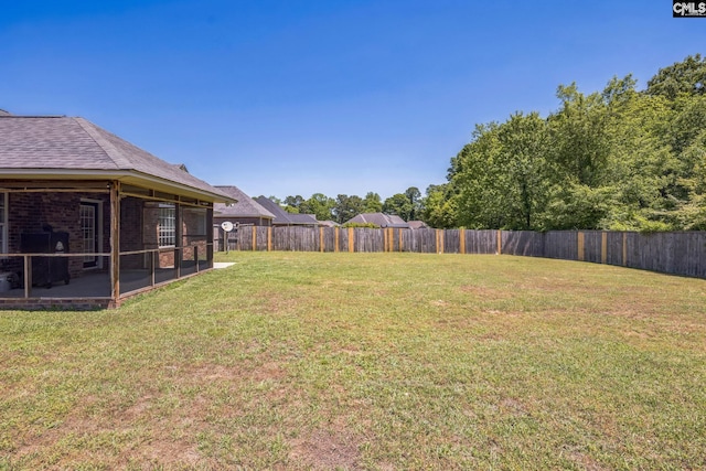 view of yard featuring a patio and a fenced backyard