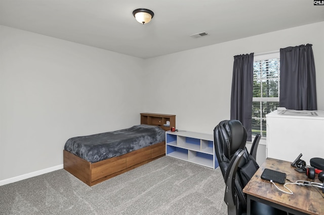 bedroom featuring carpet flooring, baseboards, and visible vents