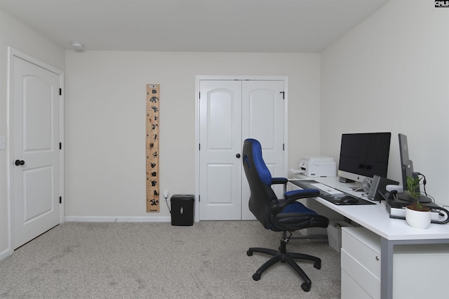 office area featuring carpet floors and baseboards
