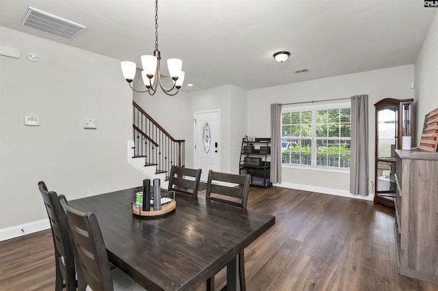 dining space featuring visible vents, baseboards, stairs, and a chandelier