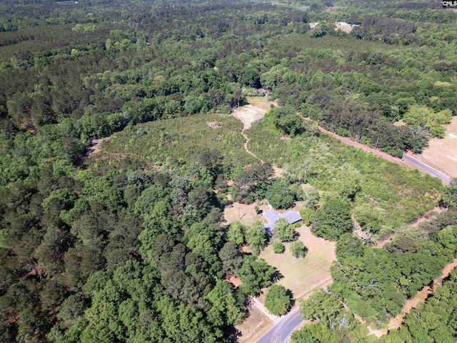 bird's eye view featuring a view of trees