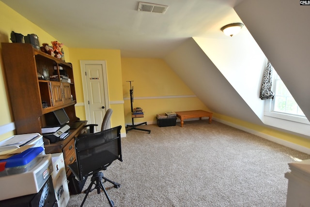 home office featuring visible vents, carpet flooring, baseboards, and vaulted ceiling