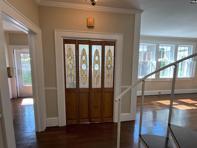 foyer entrance with baseboards, ornamental molding, and dark wood-style flooring