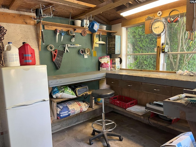 miscellaneous room with concrete flooring