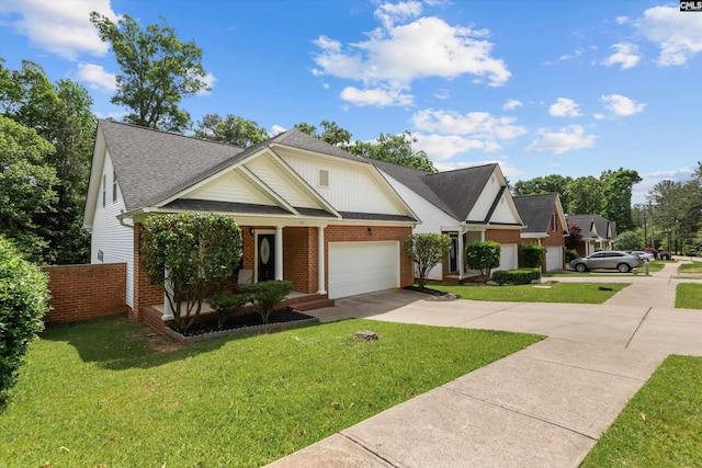 view of front of home featuring a front yard, roof with shingles, a garage, brick siding, and concrete driveway