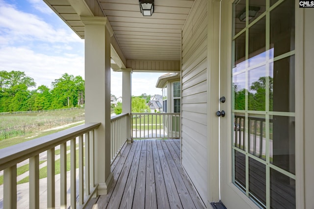 wooden deck featuring a porch