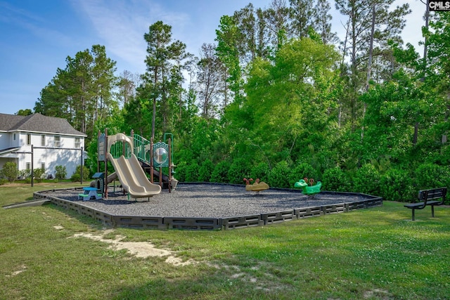 communal playground with a lawn