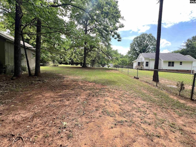view of yard with fence