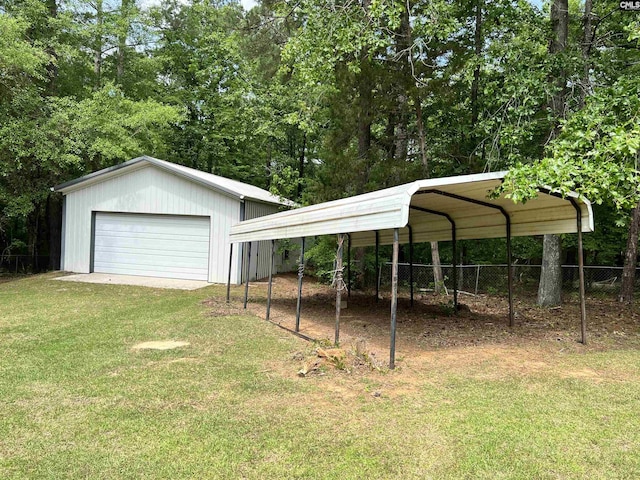 view of vehicle parking with fence and a garage