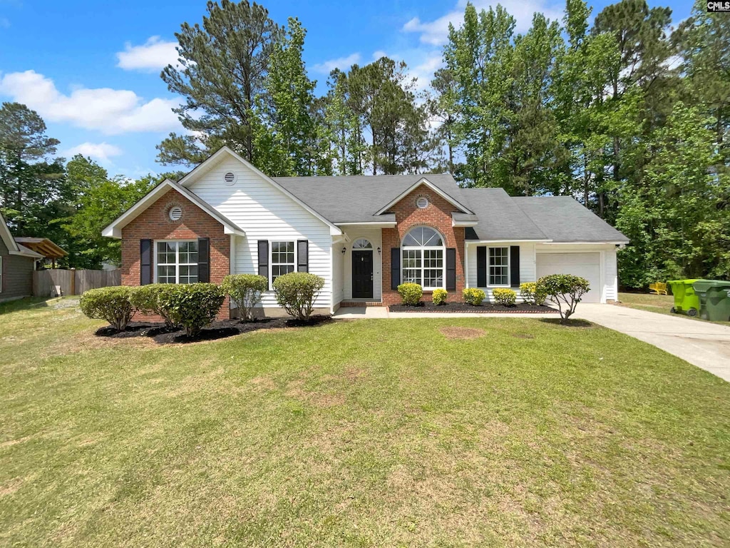10 Seehorne Ct, Columbia, SC 29229 - ranch-style house with fence, a front lawn, brick siding, a garage, and concrete driveway