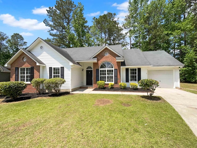 ranch-style home featuring concrete driveway, brick siding, an attached garage, and a front yard