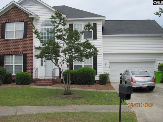 15 Mapleleaf Dr, Columbia, SC 29229 - view of front of home featuring driveway, a shingled roof, a front yard, an attached garage, and brick siding