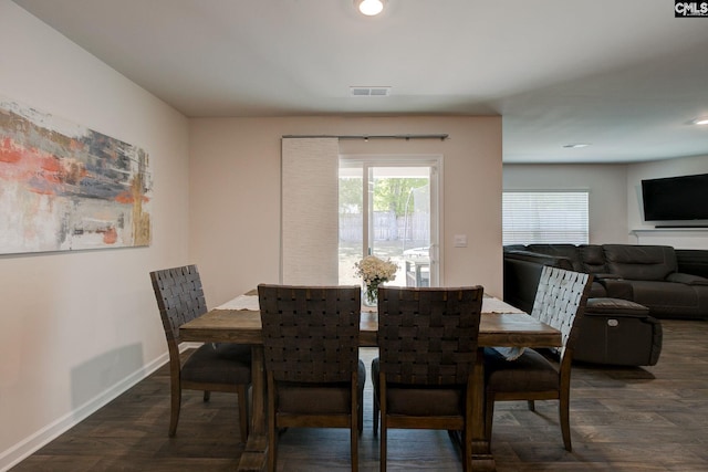 dining area featuring visible vents, recessed lighting, dark wood-style flooring, and baseboards
