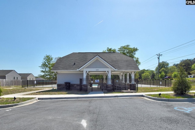 view of building exterior featuring fence