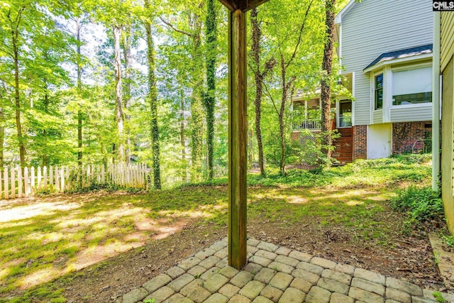 view of yard with fence and a patio area