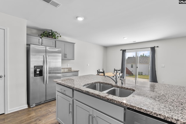 304 Sandbach Rd, Columbia, SC 29209 - kitchen with appliances with stainless steel finishes, a sink, dark wood finished floors, gray cabinets, and visible vents