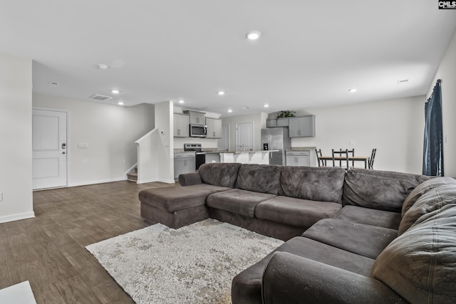 304 Sandbach Rd, Columbia, SC 29209 - living room with visible vents, stairs, baseboards, dark wood-style floors, and recessed lighting