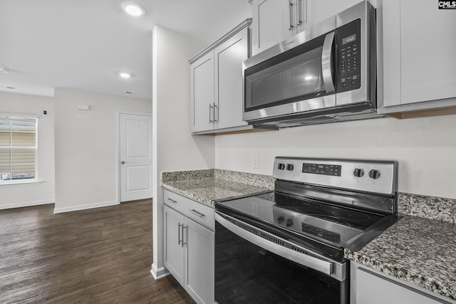 304 Sandbach Rd, Columbia, SC 29209 - kitchen featuring dark wood finished floors, baseboards, dark stone countertops, stainless steel appliances, and recessed lighting