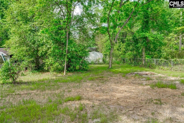 view of yard featuring fence