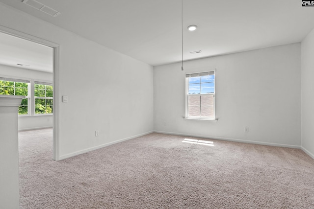 105 Maple Ct, Lugoff, SC 29073 - empty room with a wealth of natural light, carpet, and visible vents