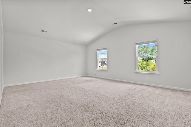 105 Maple Ct, Lugoff, SC 29073 - unfurnished room featuring baseboards, vaulted ceiling, carpet, and visible vents