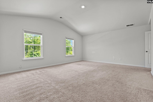 105 Maple Ct, Lugoff, SC 29073 - unfurnished room featuring carpet flooring, baseboards, visible vents, and lofted ceiling