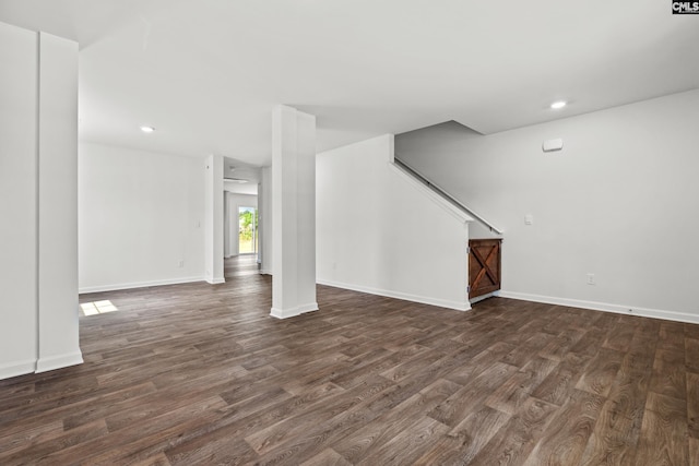 105 Maple Ct, Lugoff, SC 29073 - unfurnished living room with baseboards, recessed lighting, dark wood-style flooring, and stairs