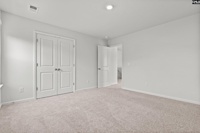 105 Maple Ct, Lugoff, SC 29073 - unfurnished bedroom featuring carpet flooring, baseboards, visible vents, and a closet