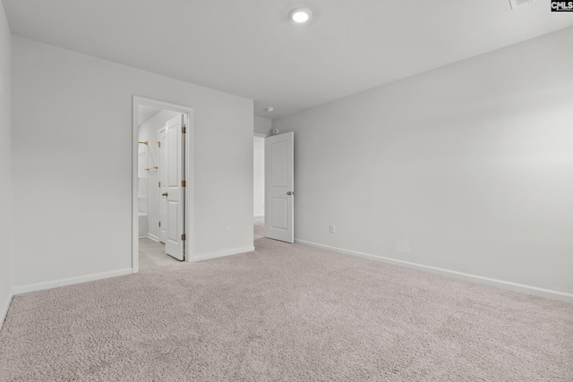 105 Maple Ct, Lugoff, SC 29073 - unfurnished bedroom with baseboards, light carpet, and ensuite bath