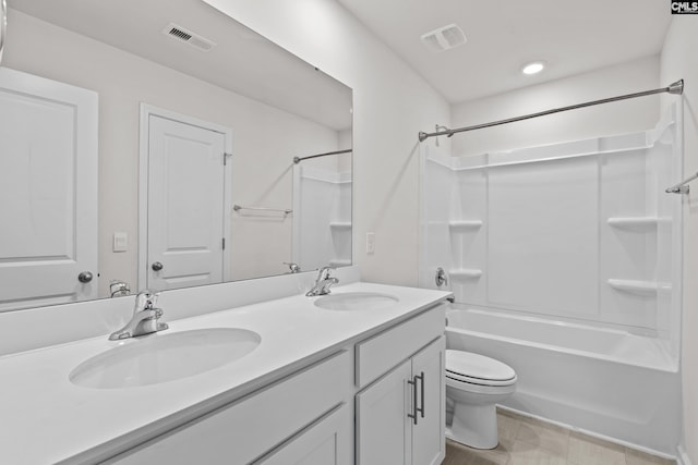 105 Maple Ct, Lugoff, SC 29073 - bathroom featuring visible vents, a sink, double vanity, and toilet