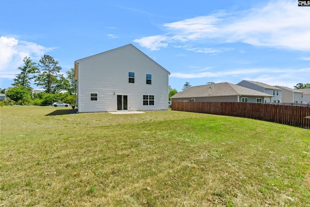 105 Maple Ct, Lugoff, SC 29073 - rear view of property with fence and a lawn