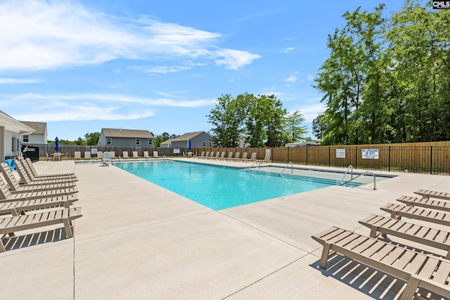 105 Maple Ct, Lugoff, SC 29073 - pool with fence and a patio area