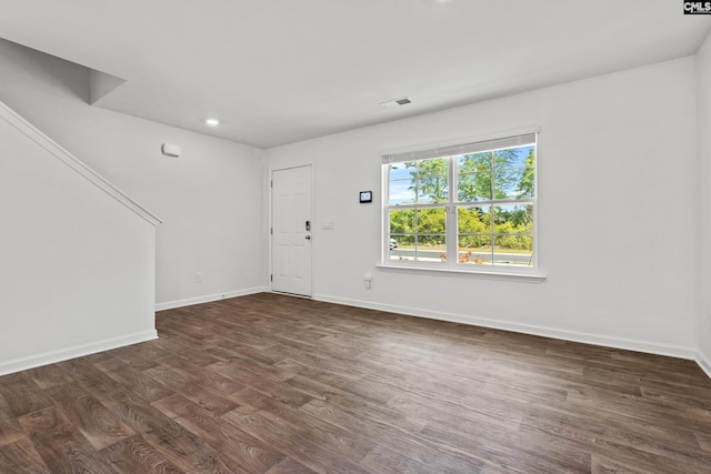 105 Maple Ct, Lugoff, SC 29073 - entryway with baseboards, visible vents, and dark wood-type flooring