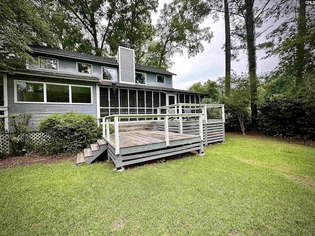 107 Old Sawmill Trl, Chapin, SC 29036 - rear view of house featuring a sunroom, a chimney, a lawn, and a wooden deck